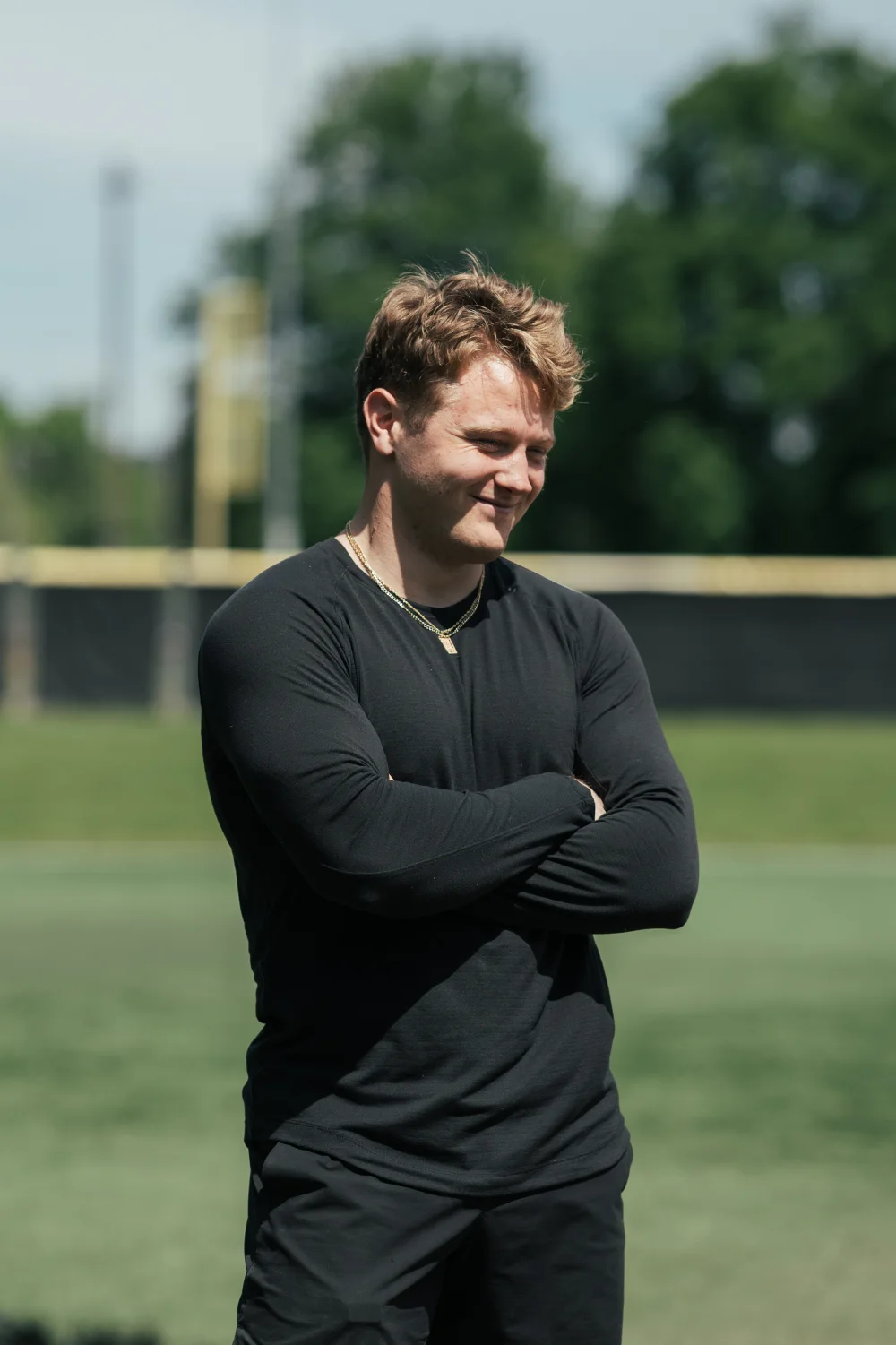 Brice Crider standing on a baseball field